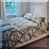 F51. Full size upholstered bed with nailhead trim. 53&rdquo;h 